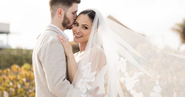 Romantic wedding kiss captured during a destination beach wedding in Punta Cana.